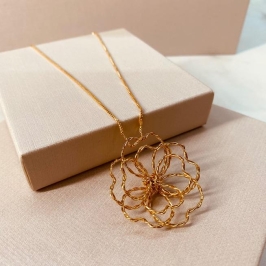 CL OURO FLOR FIOS TRANÇADOS