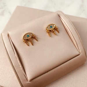 BR OURO OLHO GREGO MICRO CRAVEJADO