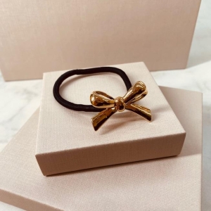 PRESILHA OURO LAÇOELASTICO