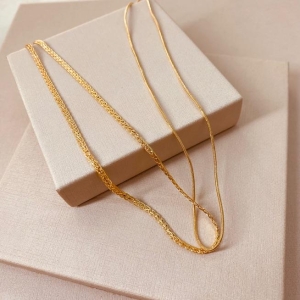 CK OURO DUPLA ENTRELAÇADA