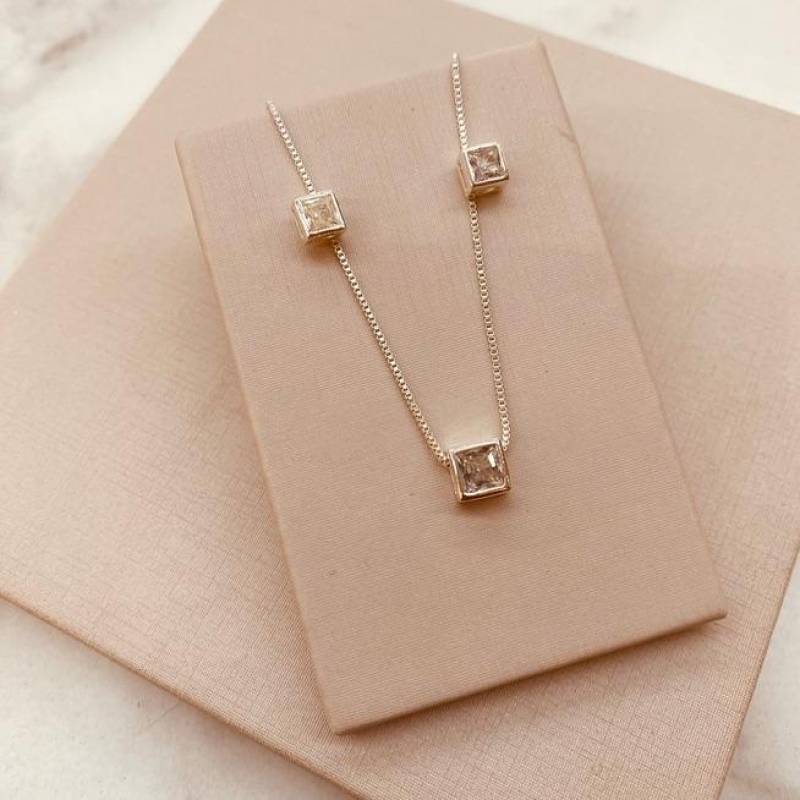 CJ PRATA PONTO DE LUZ ZIRCONIA QUADRADA CAIXA ALTA