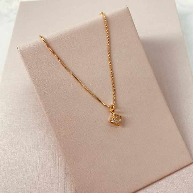 CK OURO ZIRCONIA QUADRADA COM BORBA