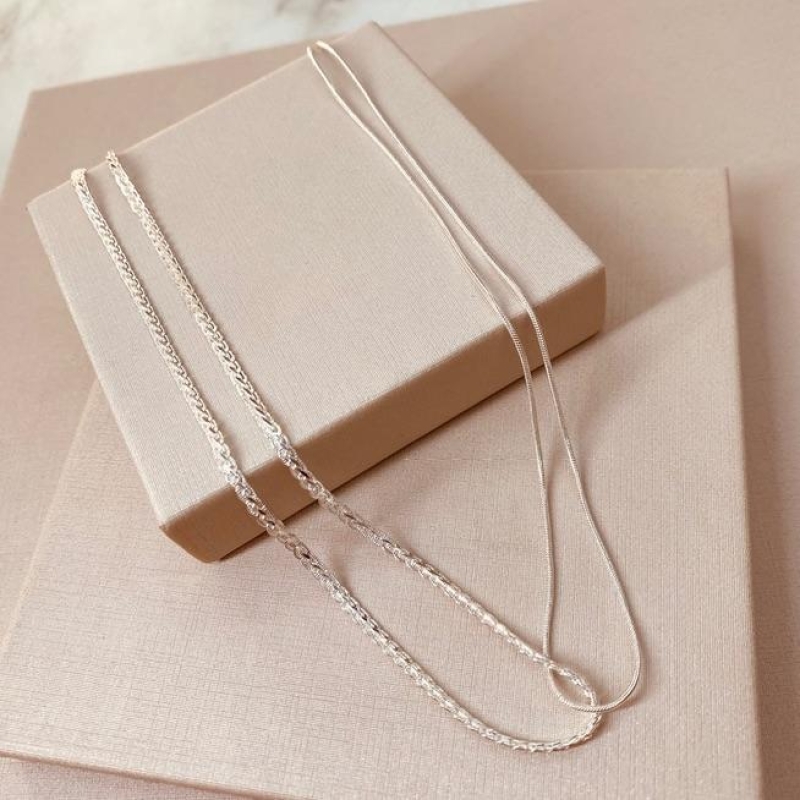 CK PRATA DUPLA ENTRELAÇADA