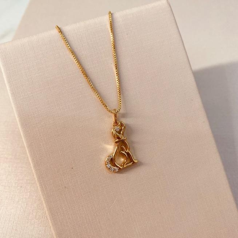 CL OURO CÃO SENTADO