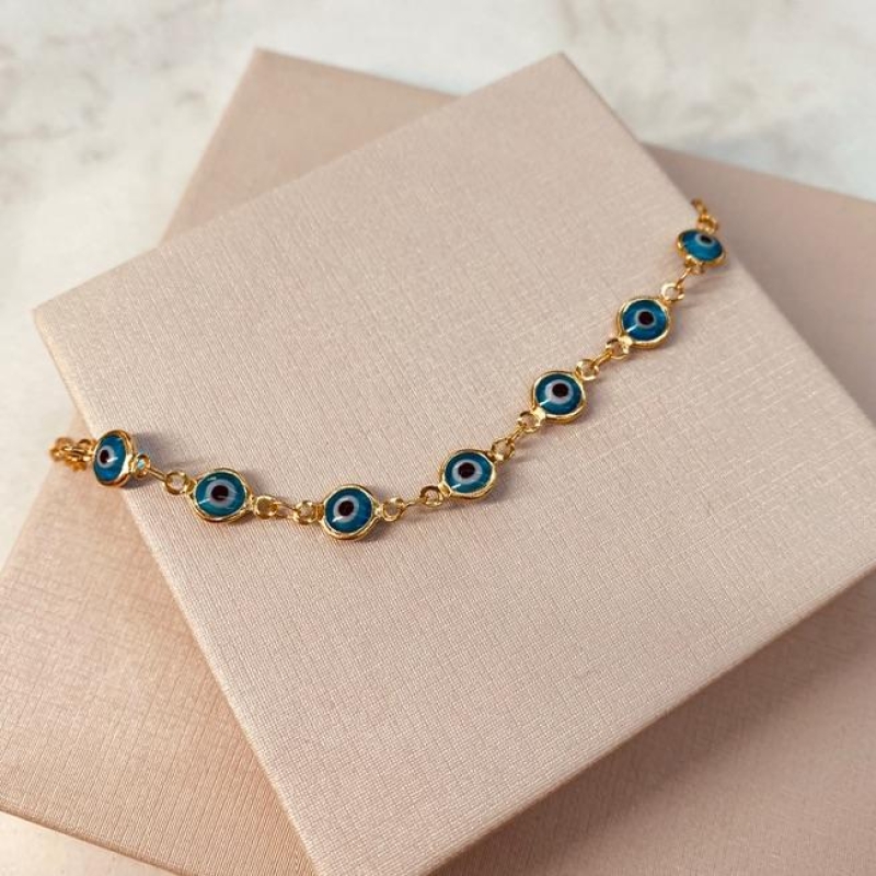 PL OURO OLHO GREGO AZUL CLARO