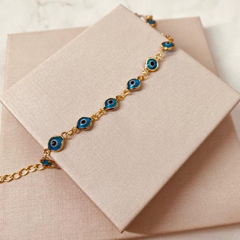 PL OURO OLHOS GREGOS