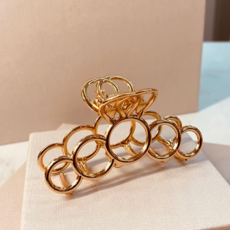 PRENDEDOR OURO CIRCULARES