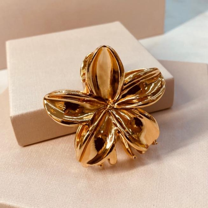 PRENDEDOR OURO FLOR