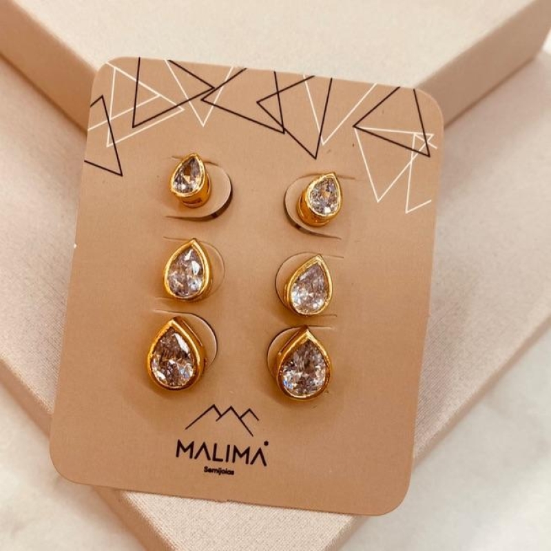 TR OURO GOTA CAIXA ALTA