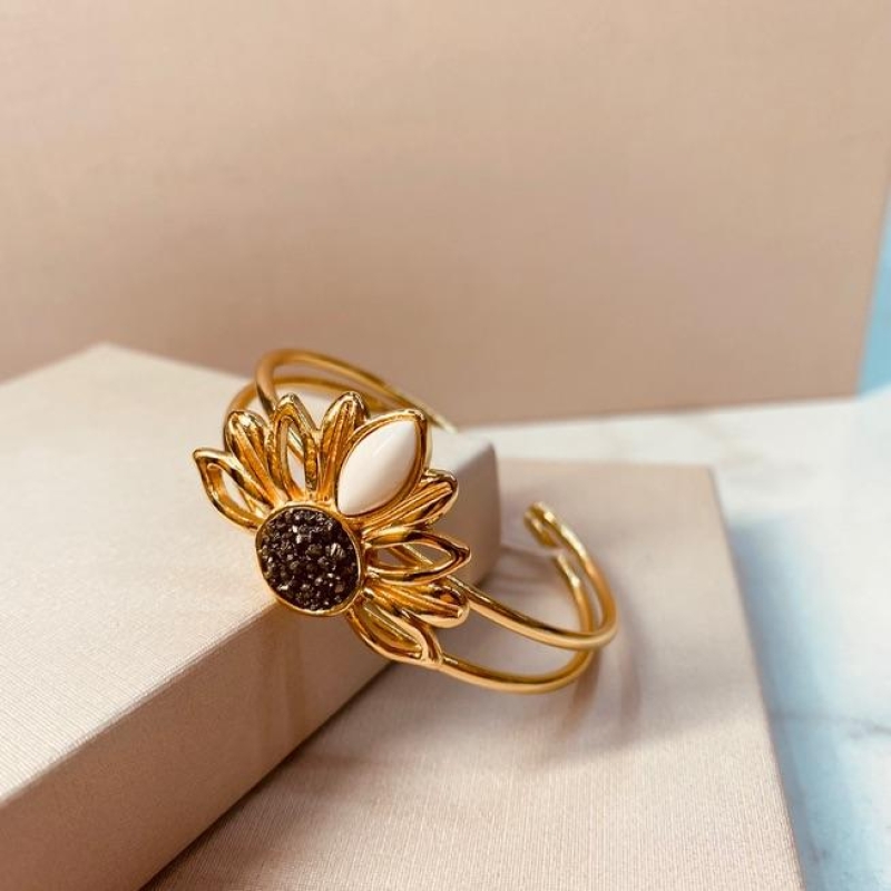 BRAC OURO GIRASSOL PIRITA E HOWLITA BRANCA