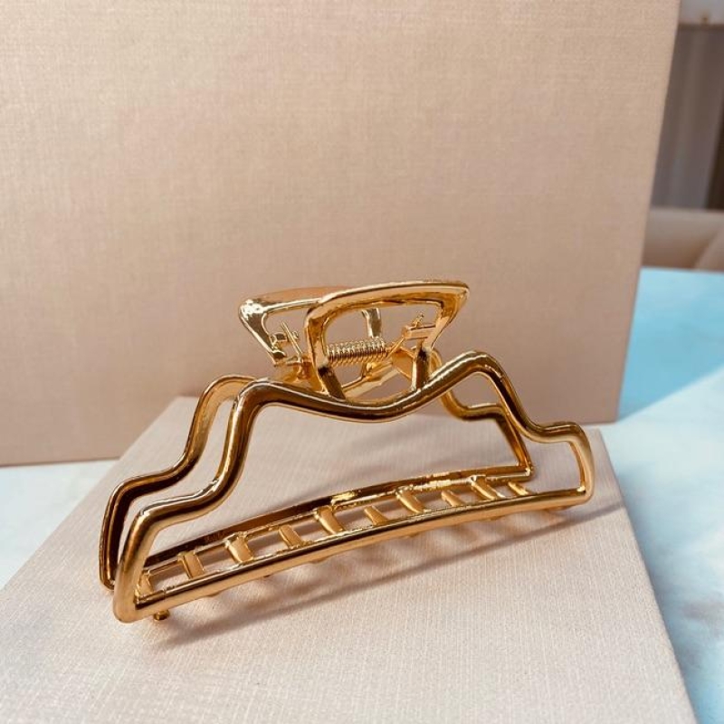 PRENDEDOR ORGANICO FINO