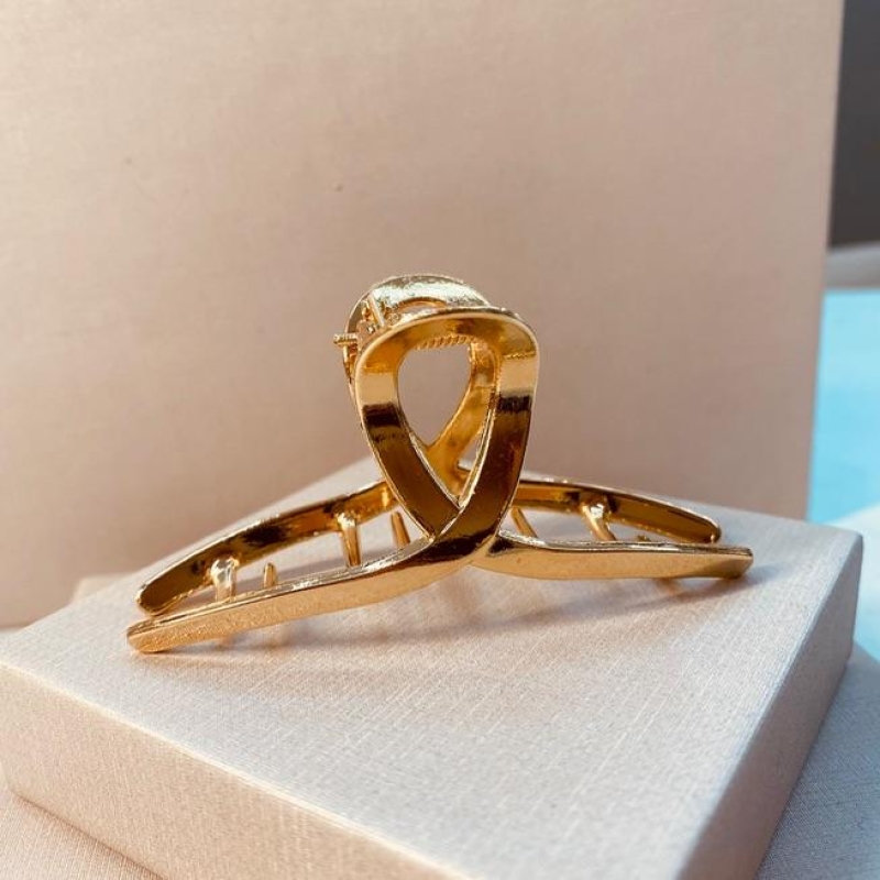 PRENDEDOR OURO LAÇO G