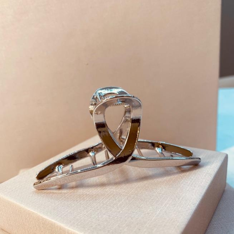 PRENDEDOR PRATA LAÇO G