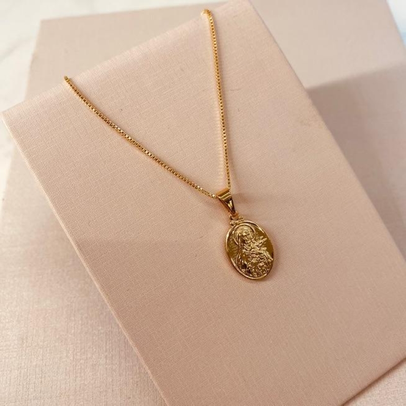 CL OURO MEDALHA OVAL SANTA TEREZINHA