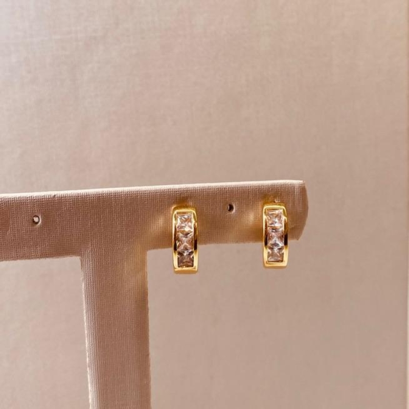 BR OURO ARGOLA 3 ZIRCONIAS BAGUETE