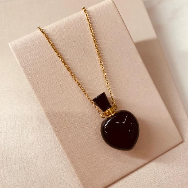 CL OURO PERFUMEIRO ONIX CORACAO