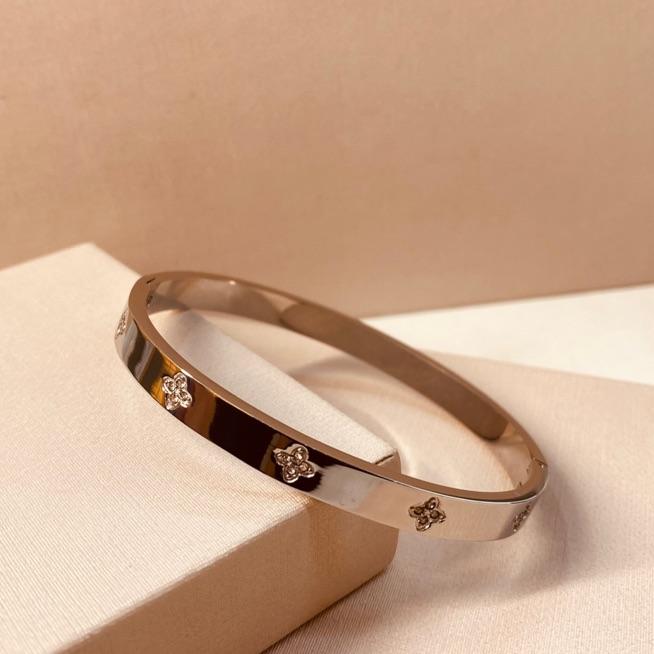 BRAC AÇO PRATA LISO FLORES VAN PEQUENAS