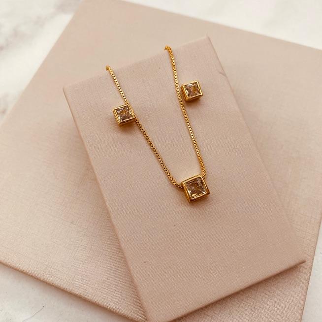 CJ OURO PONTO DE LUZ ZIRCONIA QUADRADA CAIXA ALTA