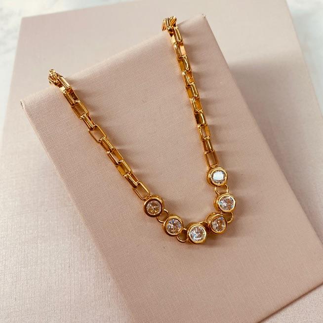 CK OURO CARTIER ZIRCONIA AO CENTRO