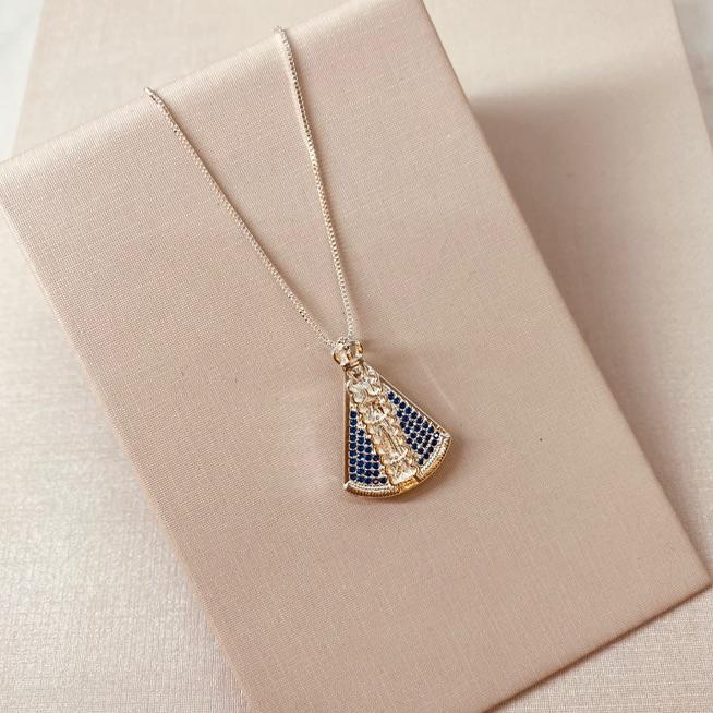 CL PRATA NSA SENHORA CRISTAL AZUL ACHATADA 60CM