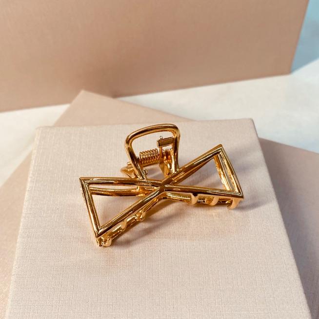 PRENDEDOR OURO AMPULHETA