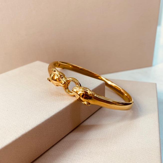 BRAC AÇO OURO ONÇA