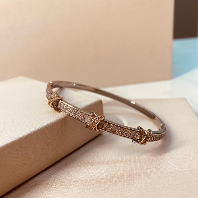 BRAC PRATA CRAVEJADO DETALHE X OURO