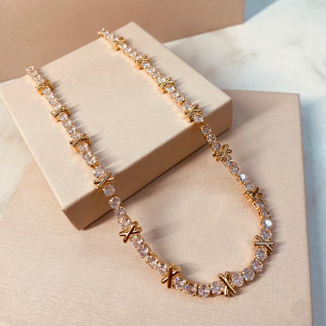 CK OURO CRAVEJADO DETALHE X